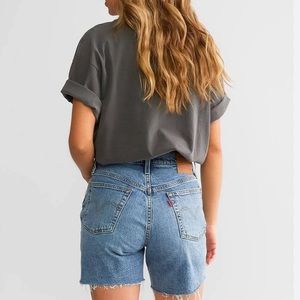 501 Mid Length Light Wash Distressed Denim Shorts Levi’s